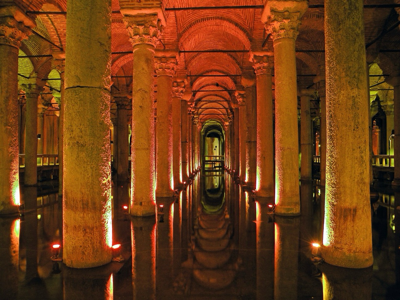 The dim, column-filled interior of the Basilica Cistern reflected in still water